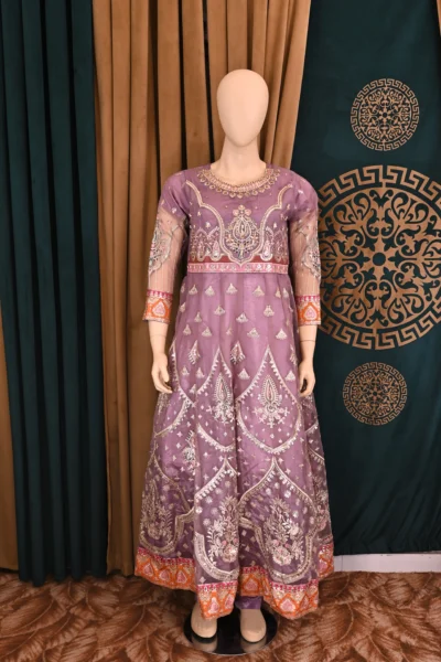 Elegant Organza Maxi with intricate heavy embroidery, paired with flapper trousers and a delicate net dupatta, perfect for traditional Pakistani and Indian wear, ideal for weddings and festive occasions