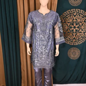 Handmade traditional wear featuring heavy floral embroidery on net and cambric fabric, showcasing elegant Pakistani and Indian design with intricate craftsmanship