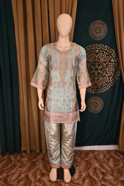 Traditional Pakistani and Indian wear featuring heavy floral embroidery on luxurious organza and silk capri fabric, handcrafted for a sophisticated and elegant look.