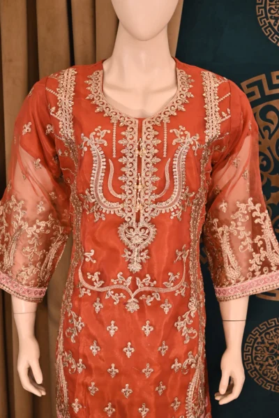 Traditional Pakistani and Indian wear featuring heavy floral embroidery on luxurious organza and silk capri fabric, handcrafted for a sophisticated and elegant look.