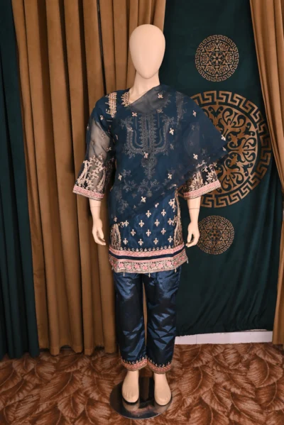 Traditional Pakistani and Indian wear featuring heavy floral embroidery on luxurious organza and silk capri fabric, handcrafted for a sophisticated and elegant look.