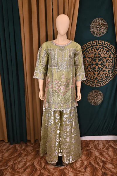 Elegant traditional wear featuring intricate floral embroidery on luxurious organza fabric. Handmade with rich craftsmanship, ideal for special occasions and cultural celebrations.