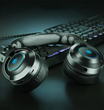 The PHOINIKAS Q9 Wired Gaming Headset featuring multi-platform compatibility, with options for PlayStation 4, Xbox One, PC, and more. Includes an external noise-reduction microphone for gaming and a built-in microphone for Bluetooth leisure mode. Offers 40mm speakers for 7.1 stereo surround sound, an adjustable padded headband, and soft memory foam earmuffs for comfortable extended use. Available in red, green, and blue